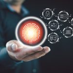 Businessman show a fingerprint scanning unlock and access to business data network. Biometric identification and cyber security protect business transaction from online digital cyber attack.